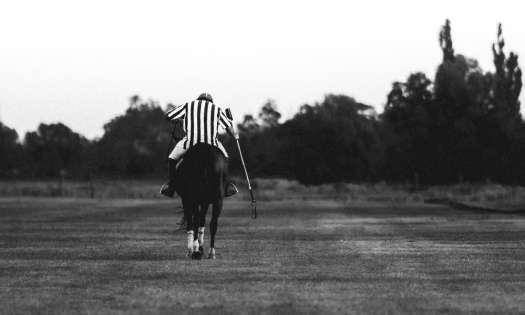 Person playing polo.