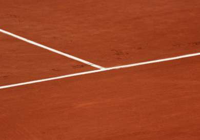 Red clay tennis court.