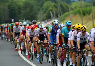 Group of cyclists competing in tour de france.