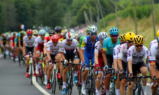 Group of cyclists competing in tour de france.