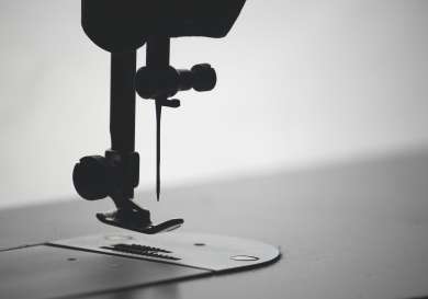 Black and white image of a sewing machine.