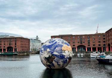 Eurovision Song Contest Floating Earth on a body of water in Liverpool.