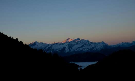 Landscape of Gstaad, Switzerland at sunset/dusk.