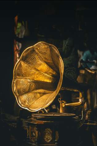 Large golden engraved gramophone.