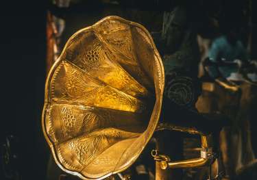 Large golden engraved gramophone.