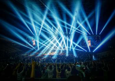 Concert with blue spotlights.