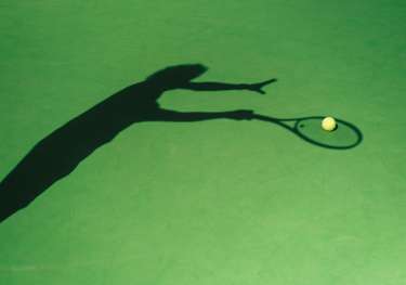 Shadow of tennis player.
