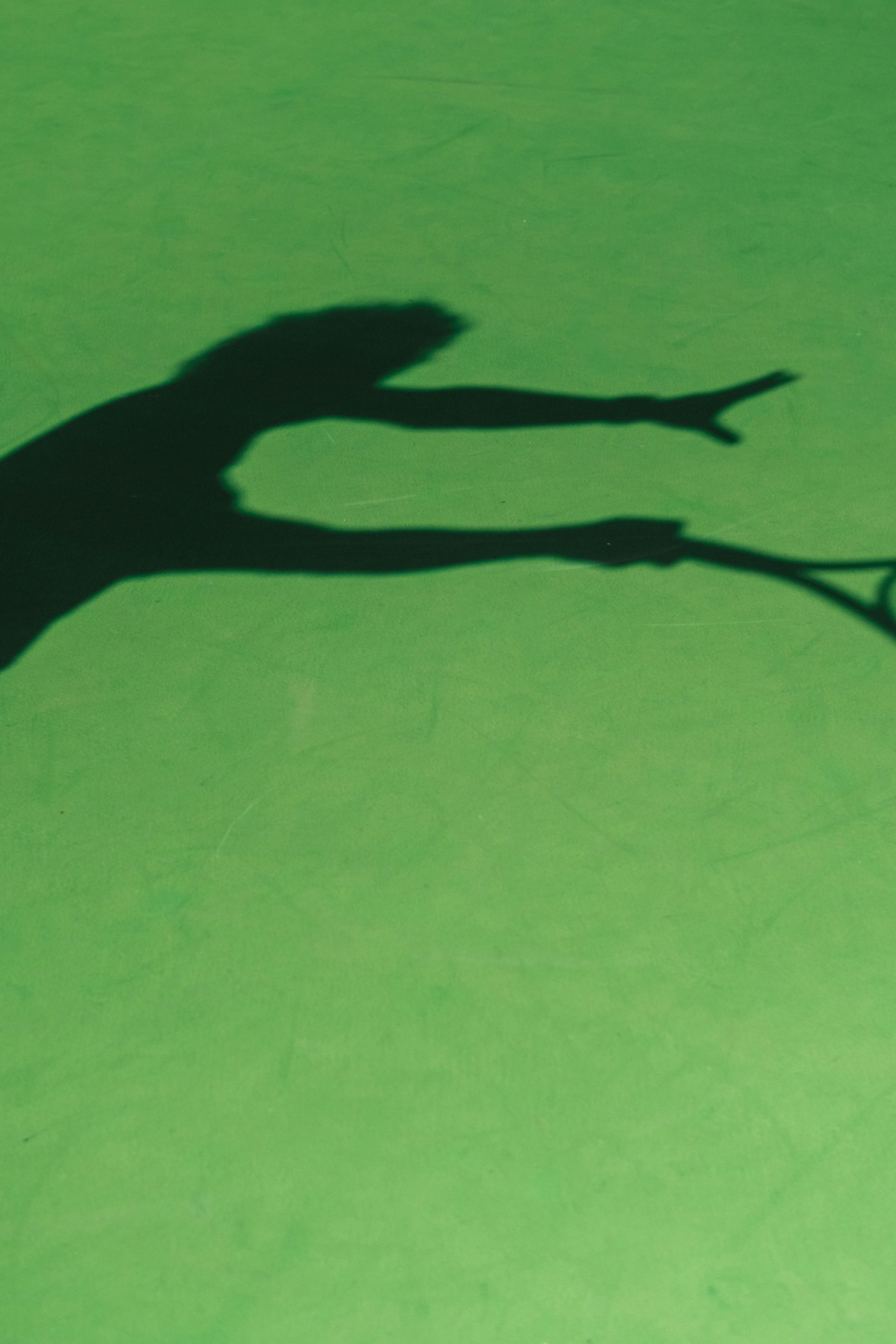 shadow of tennis player
