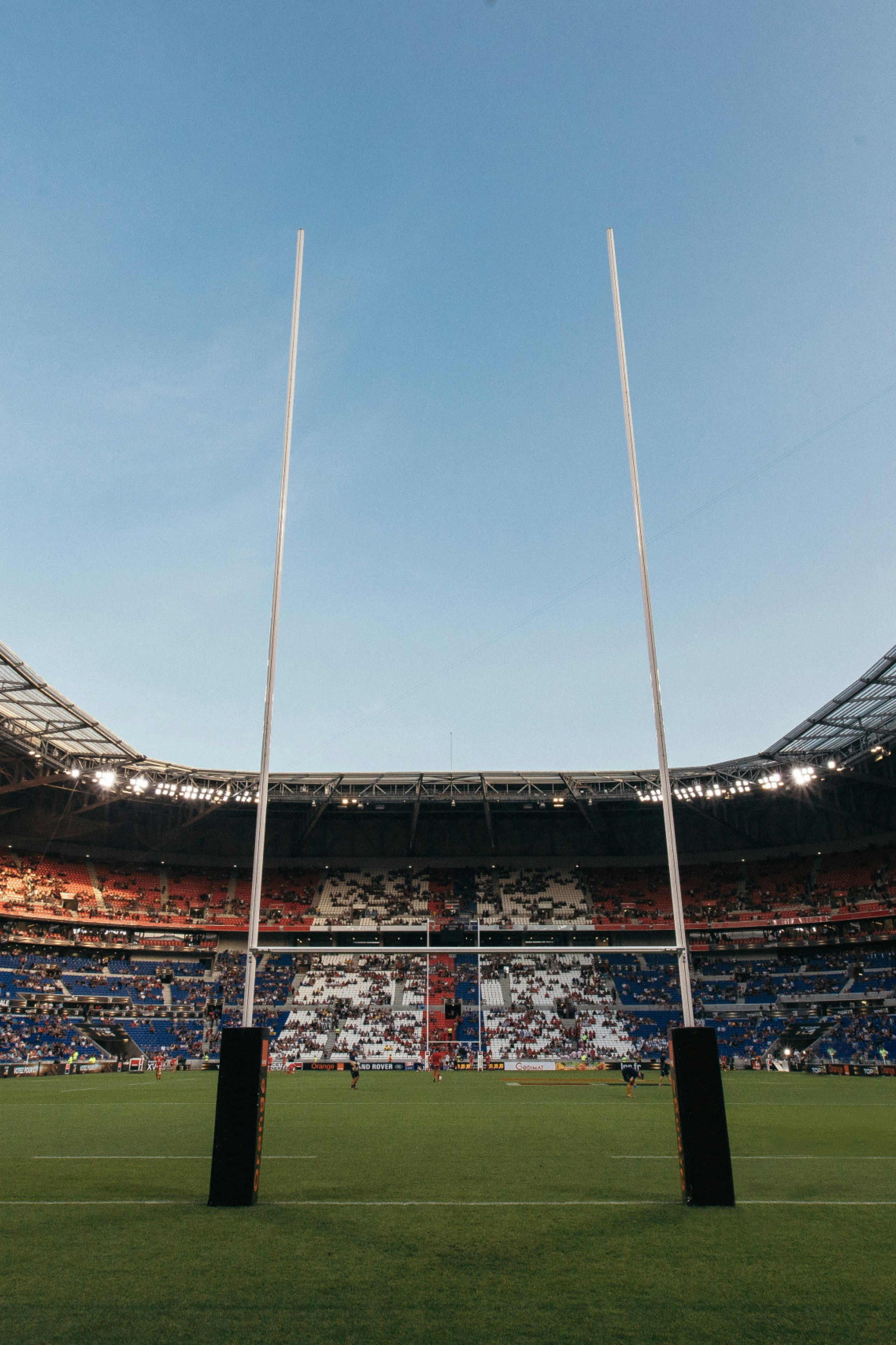 stadium with a rugby field and post