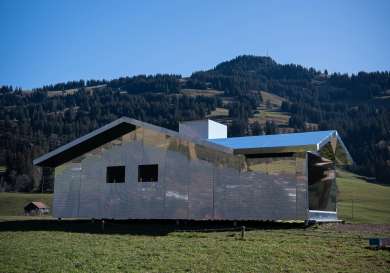 Entirely relective mirror house in Gstaad, Switzerland.
