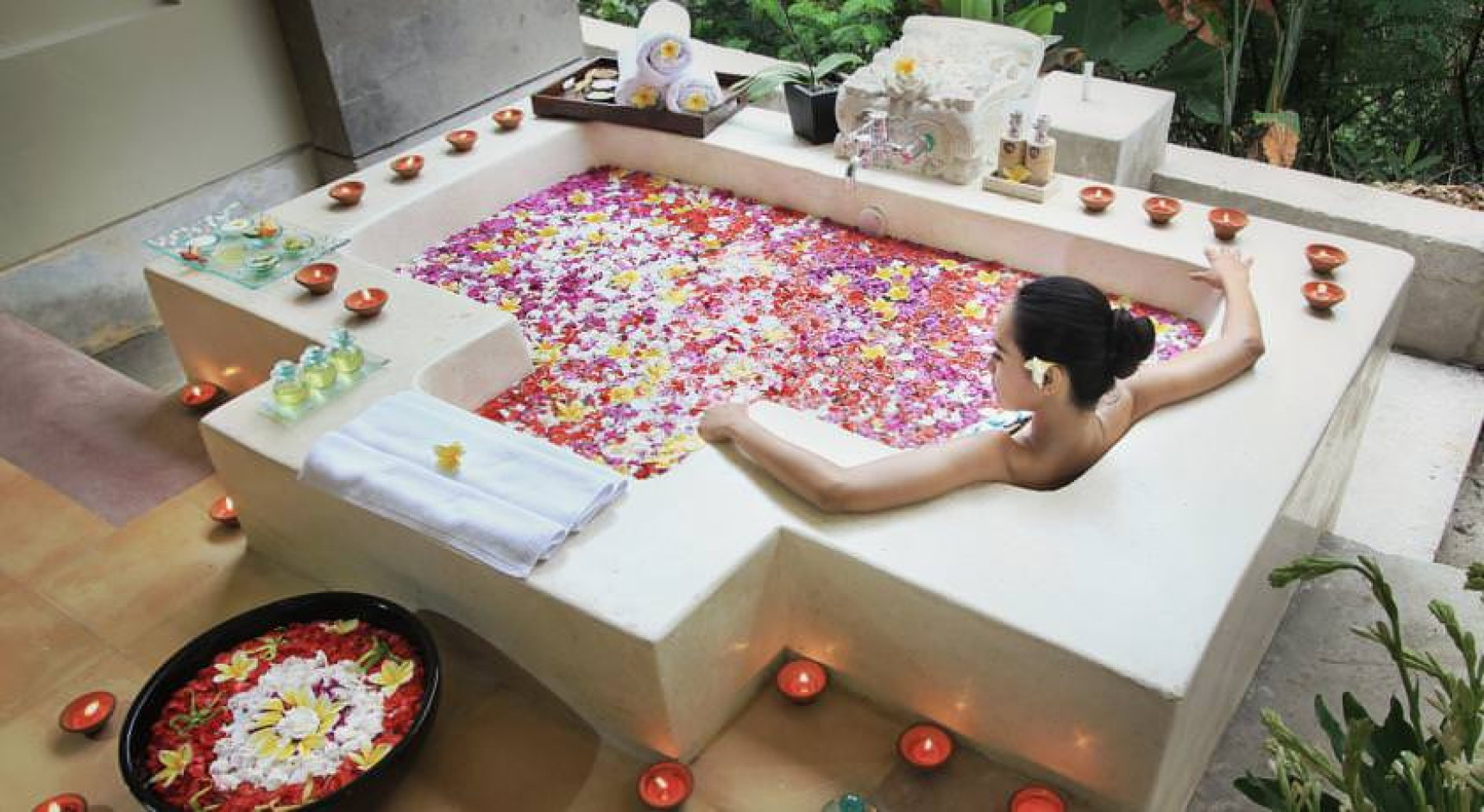 woman in a Flower bath in Bali