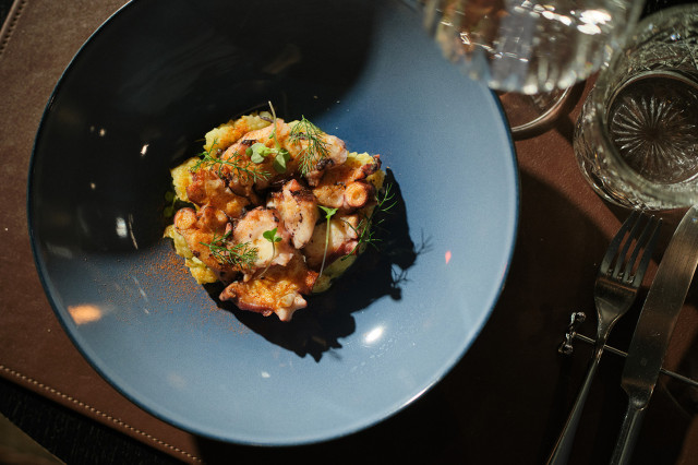 seafood dish served in blue bowl