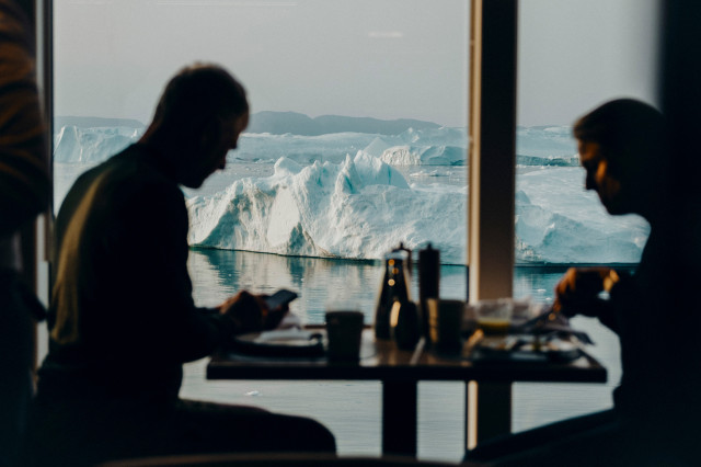 two people eating at table in greenlandic restaurant