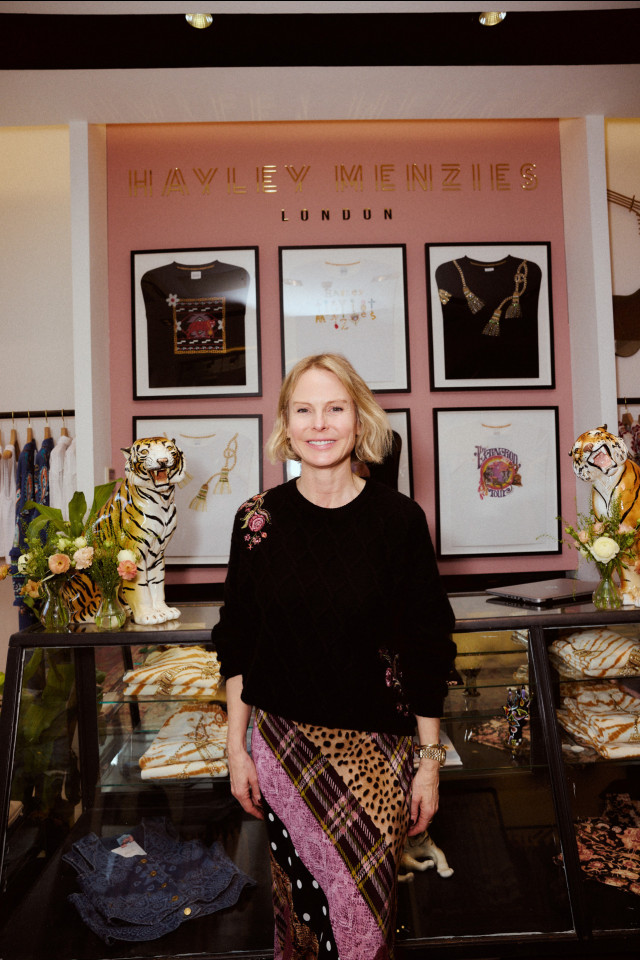 headshot of hayley menzies posing in shop 