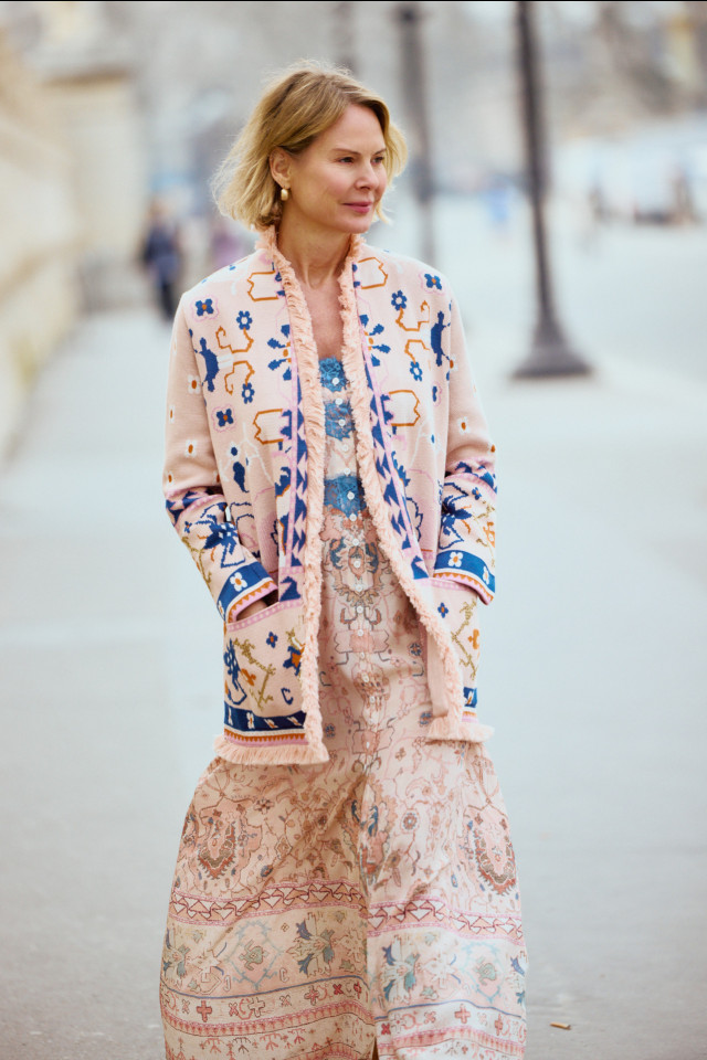 hayley menzies walking down the street in pink outfit