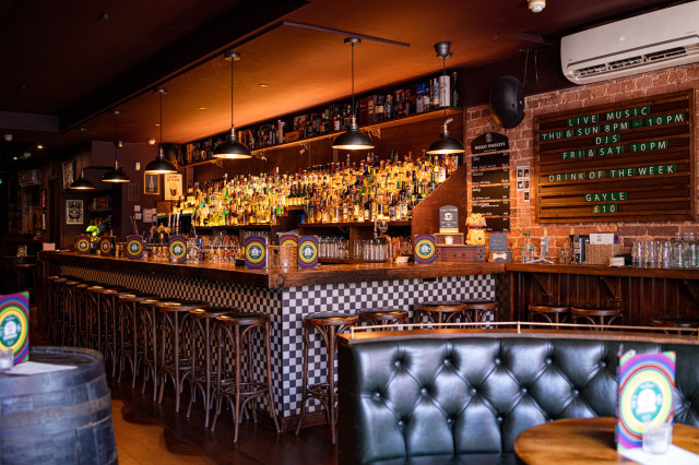 homeboy bar in inslington with leather seating and stools
