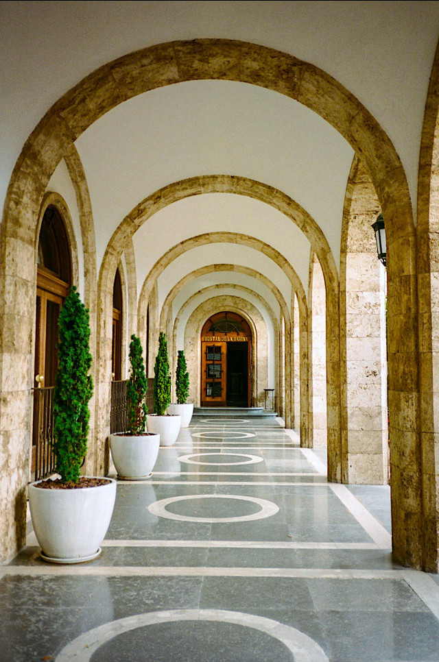 arched entrance to hotel in spain
