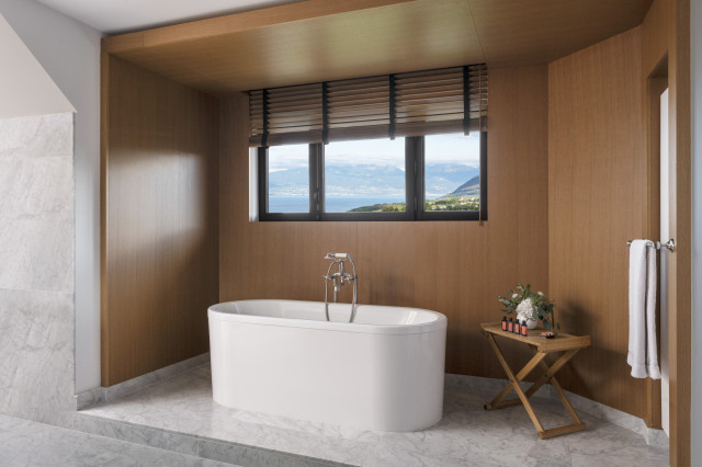 evian resort bathroom with marble slabs 