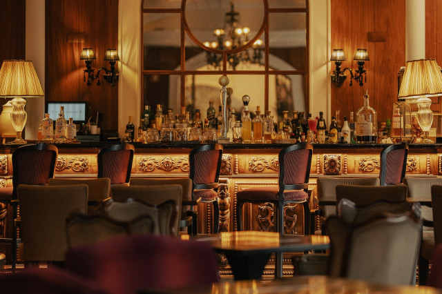 restaurant bar with stools and warm lighting