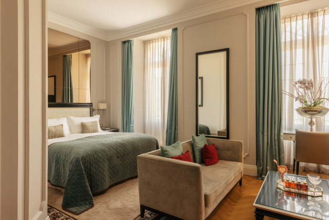 hotel bedroom with sofa 