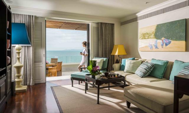 room with lounge area and ocean views 