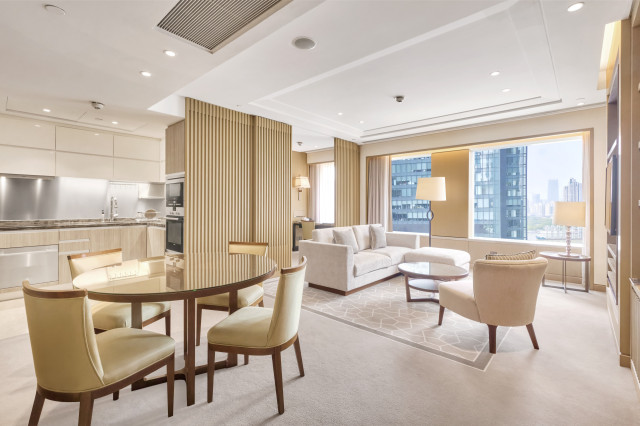 luxurious open-plan living space with cream interiors