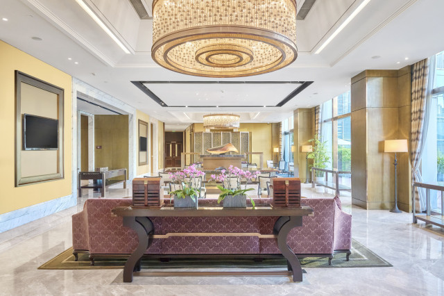luxurious lobby area with chandeliers