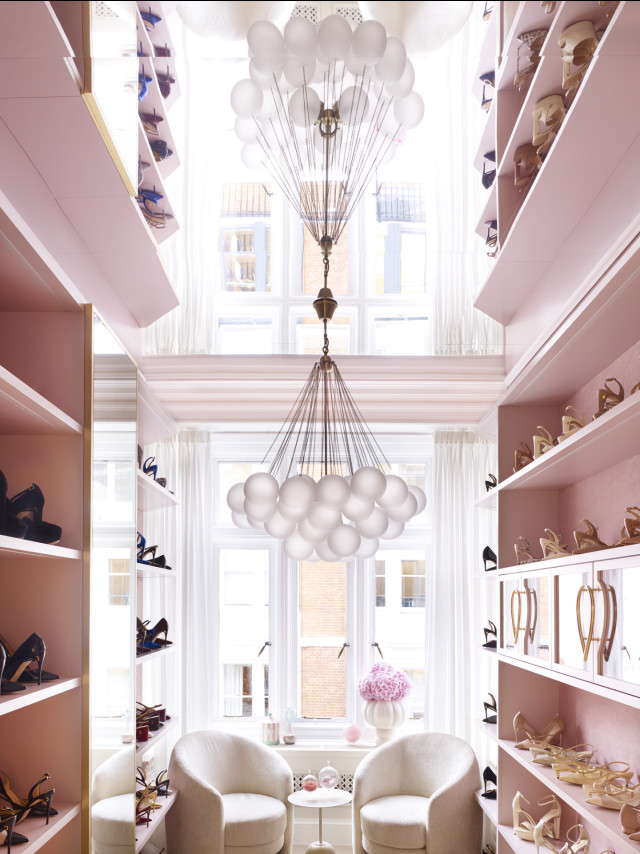 pink shoe closet with bubble chandelier