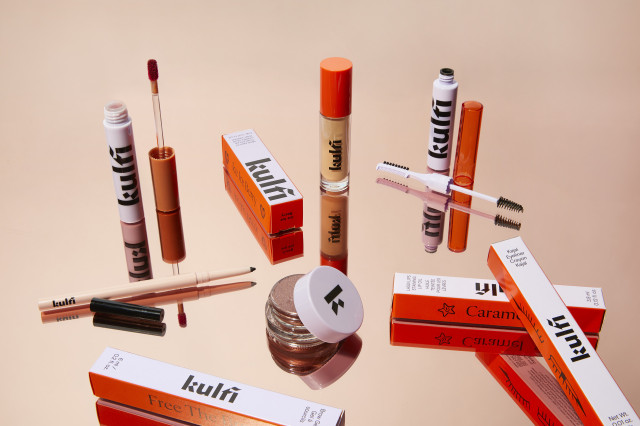 beauty products on mirrored surface