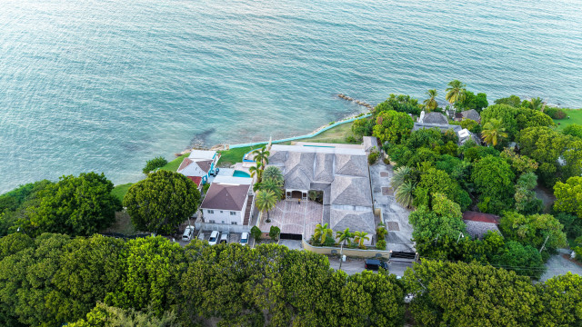 aerial view of property by the sea in the caribbean 