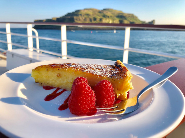 slice of lemon tart with raspberries