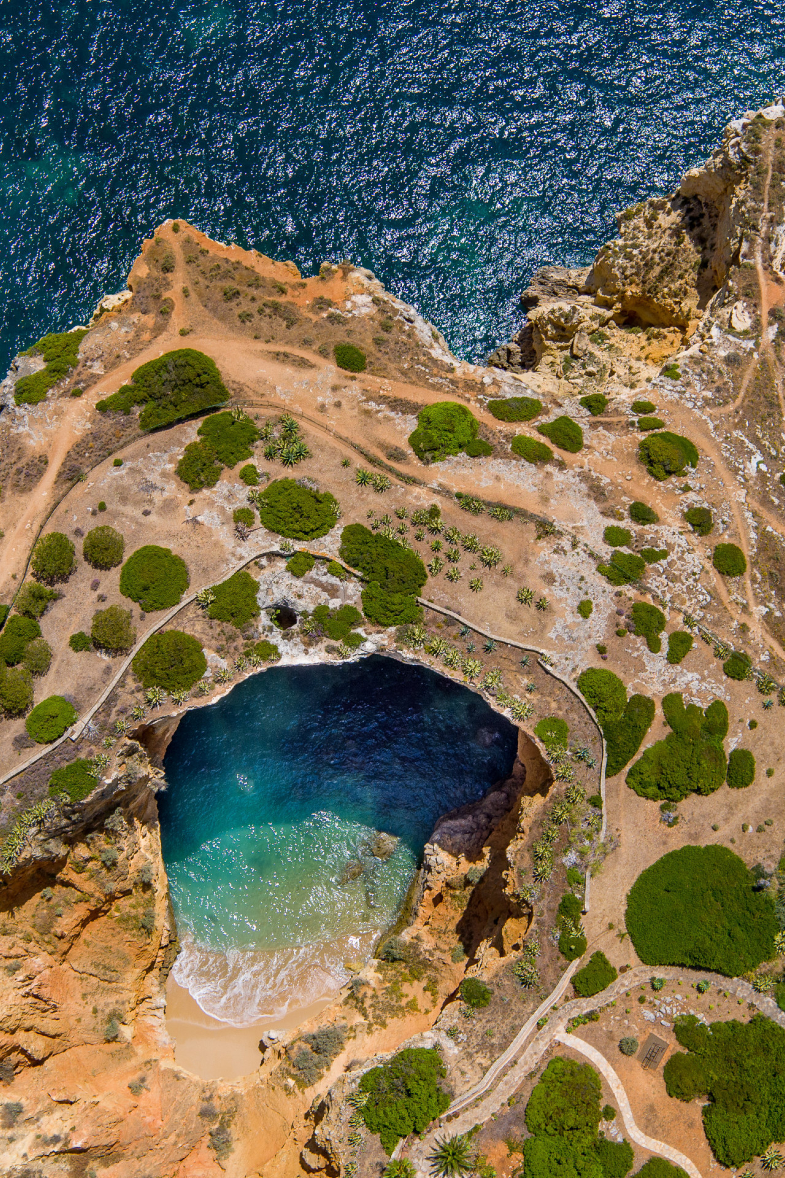 aerial view of cliffs in the algarve, portugal 