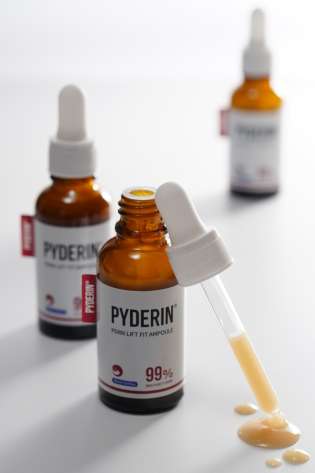 Skincare in bottle with ampoule applicator.