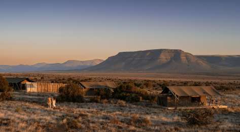 Samara plains camp at sunrise .