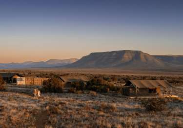 Samara plains camp at sunrise .