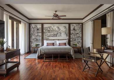 Hotel suite with king-sized bed.