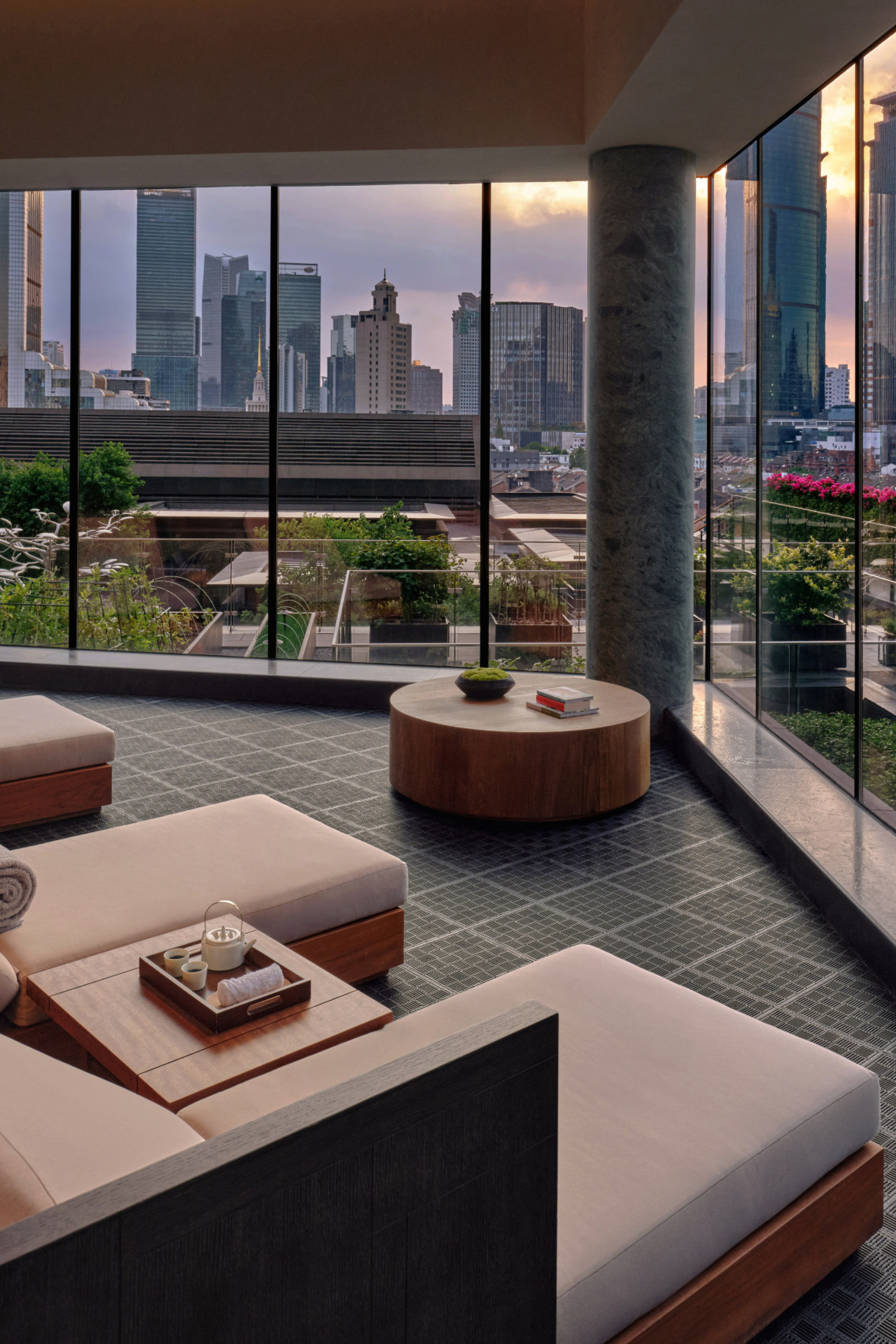 hotel seating area with skyline views of shanghai 