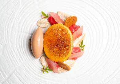 Creme brulee on white dish.