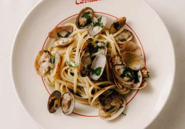 Bowl of spaghetti vongole at carmelina's .
