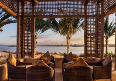 Sir bani yas island: an eco wildlife safari on the persian gulf beach hut luxury.