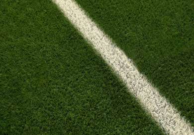 Edge of football pitch.