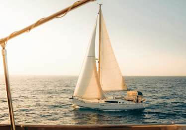 Yacht with sails .