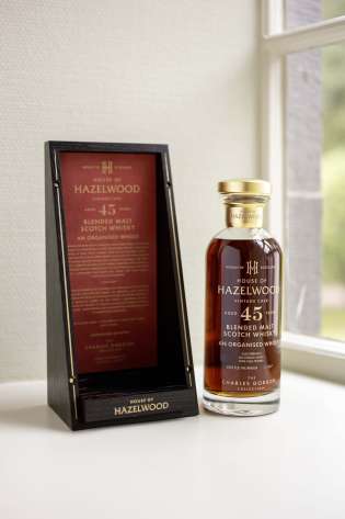 Bottle of whisky on windowsill .