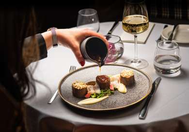 Photo of meat dish at restaurant in aria hotel .