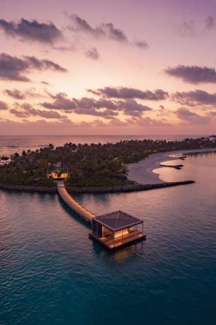 Aerial view of arrival pontoon at maldivian hotel.