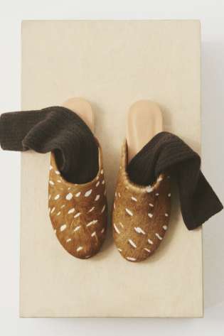 Pair of bambi slippers with socks .