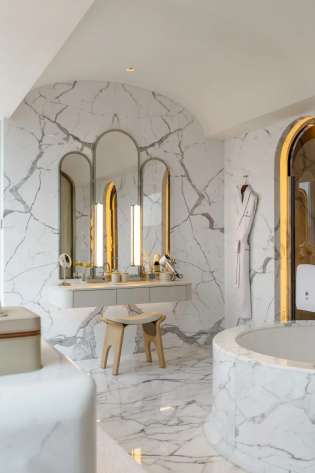 Marble hotel bathroom.