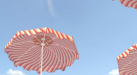 Red-and-white striped umbrellas jutting into blue sky.