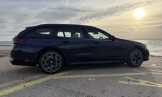 Side view of parked bmw 530e .