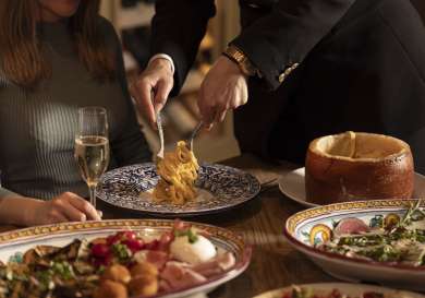 Person serving linguine at bocconcino london.